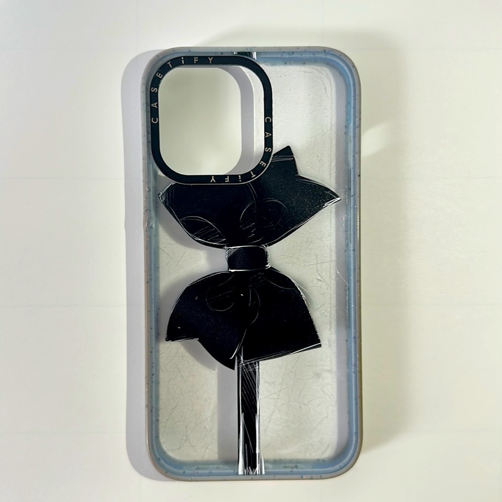 Casetify iPhone 13 Pro case- black bow with baby blue trim